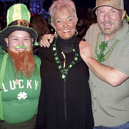 (left to right) Fluffy Ortega, Paulette Lanza, and Andy Guthridge at Freddie's Beach Bar for St. Patrick's Day Celebration